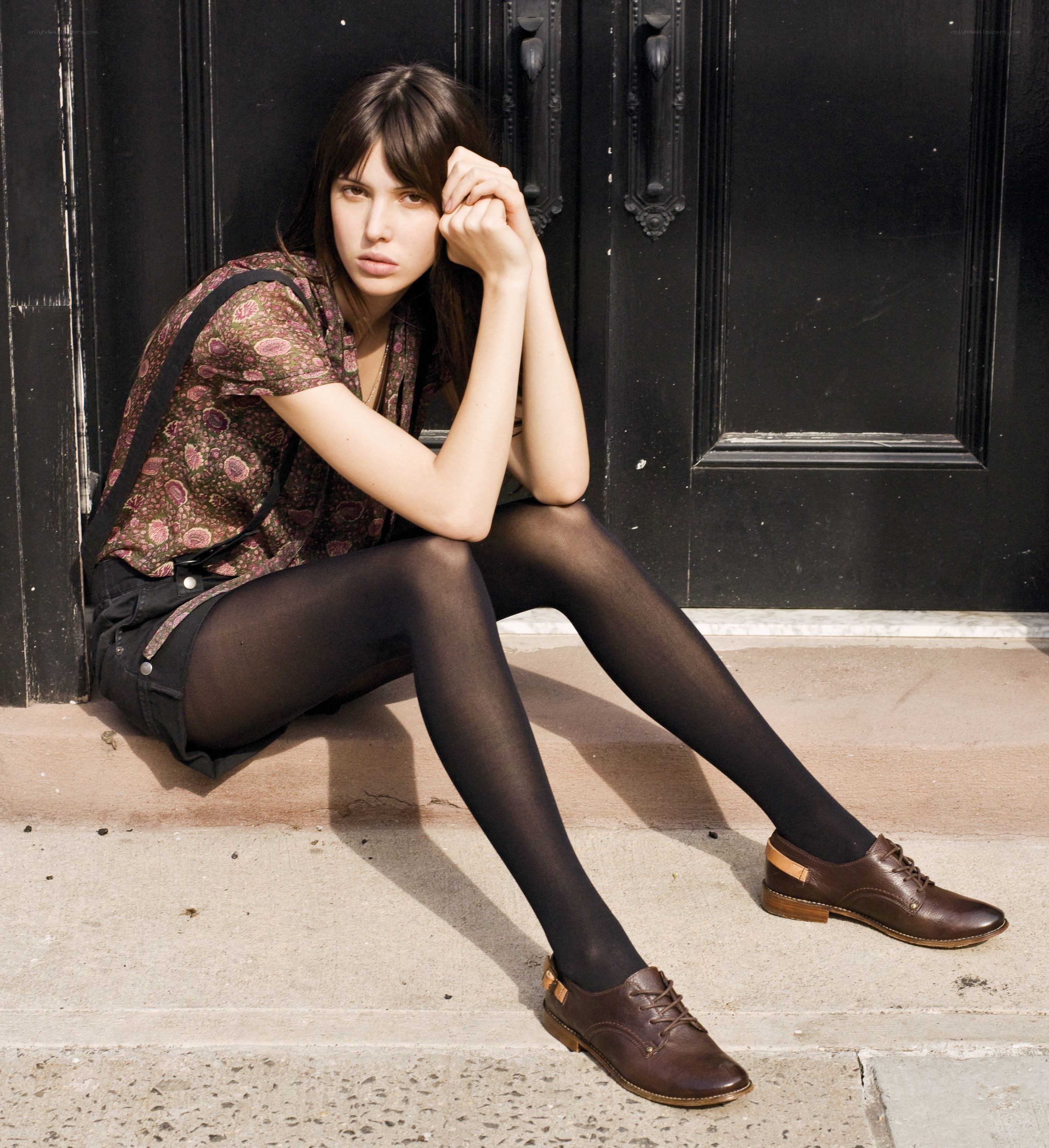 woman sitting on steps