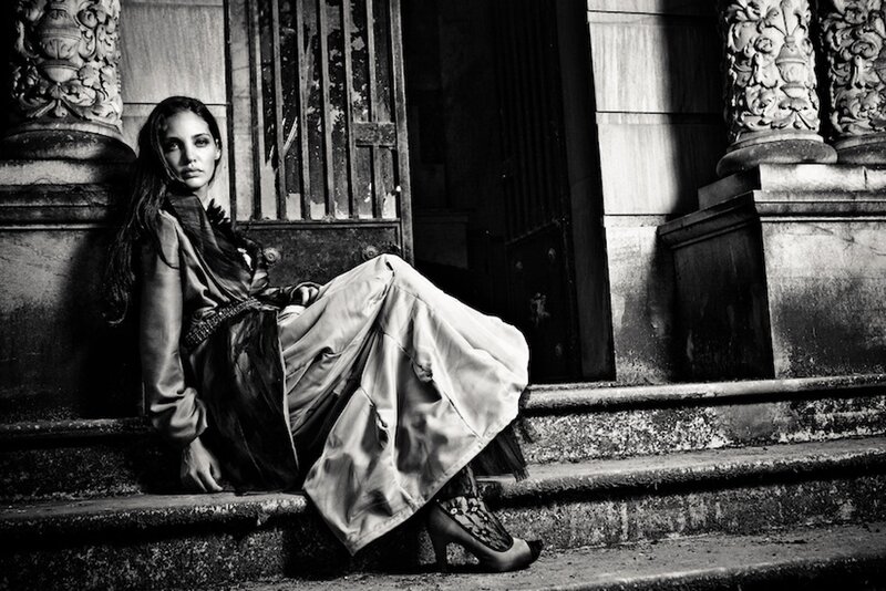 Woman Sitting on Steps — Black, Dramatic, Photograph, Columns
