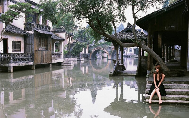 Woman Sitting on Steps — Green, Serene