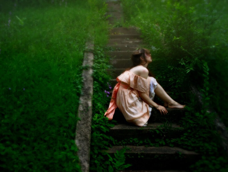 Woman Sitting on Steps — Green