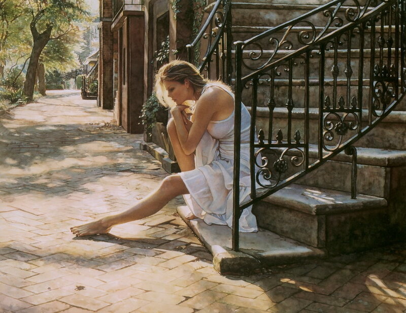 Woman sitting on steps in sunlight