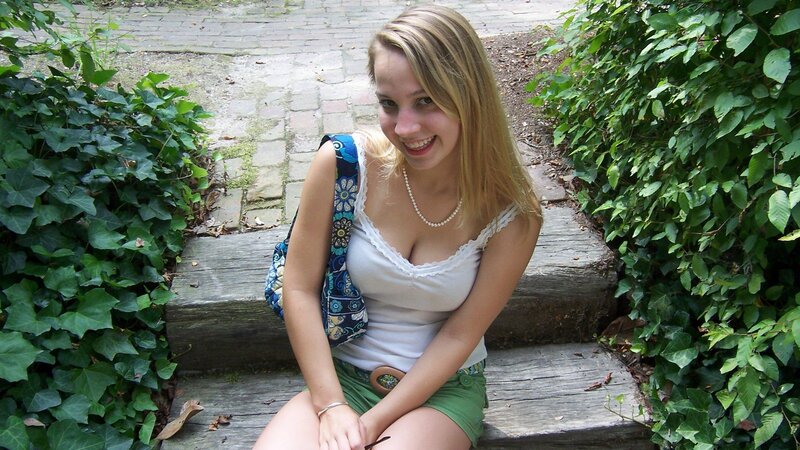 woman sitting on steps outdoors