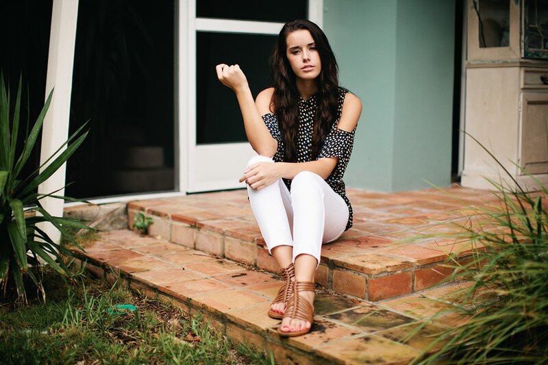 Woman Sitting on Steps — White, Calm, Afternoon, Photograph, Plant