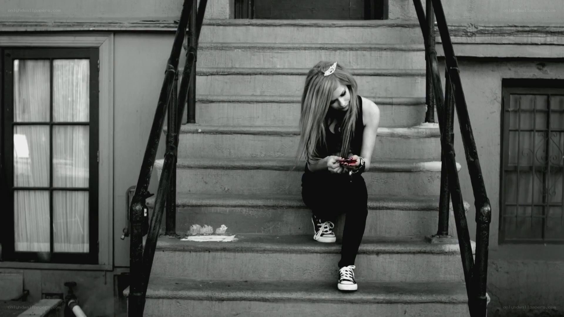 woman sitting on steps