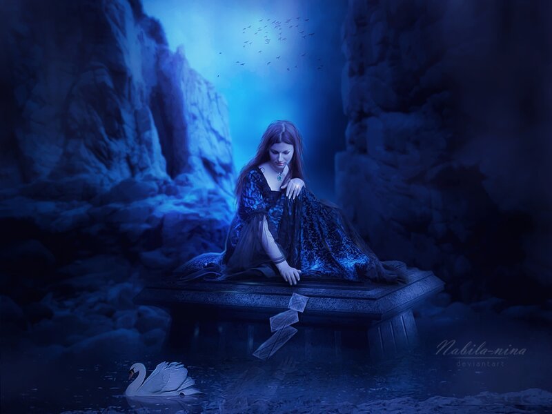 Woman Sitting on Stone Bench — Blue