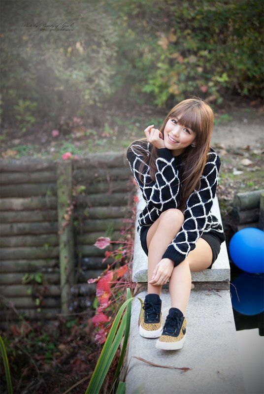 Woman Sitting on Stone — Black, Calm