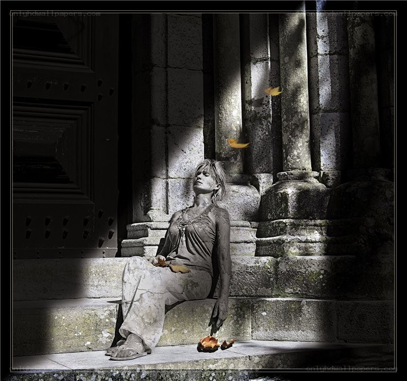 woman sitting on stone steps