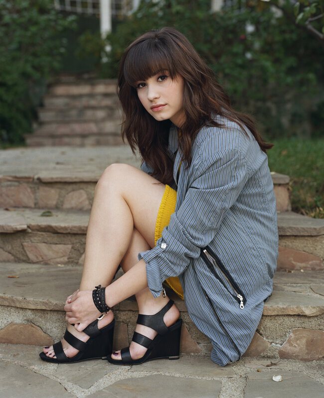woman sitting on stone steps