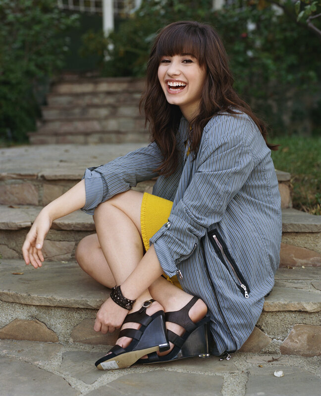 woman sitting on stone steps