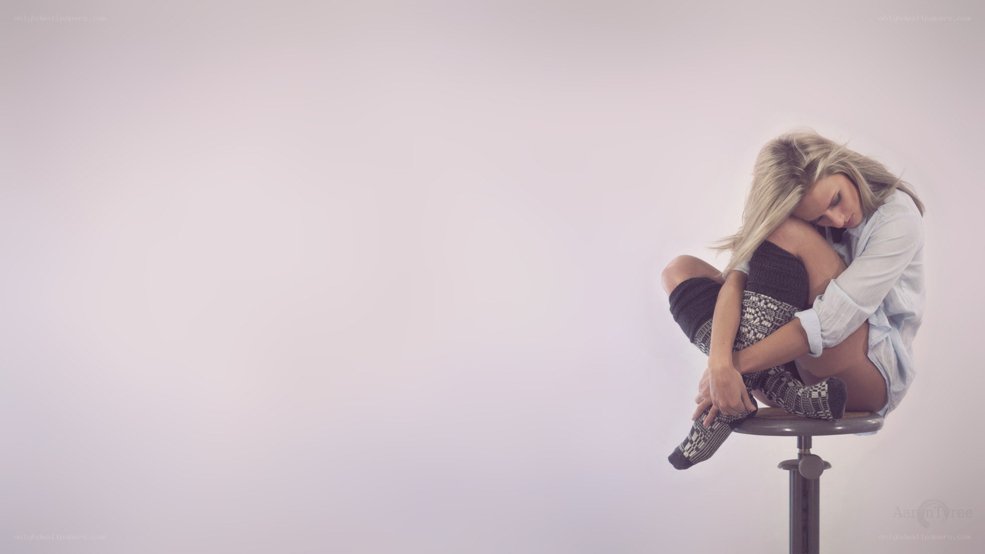 woman sitting on stool