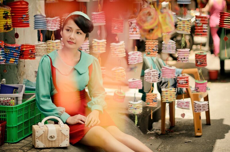 Woman Sitting on Street — Red