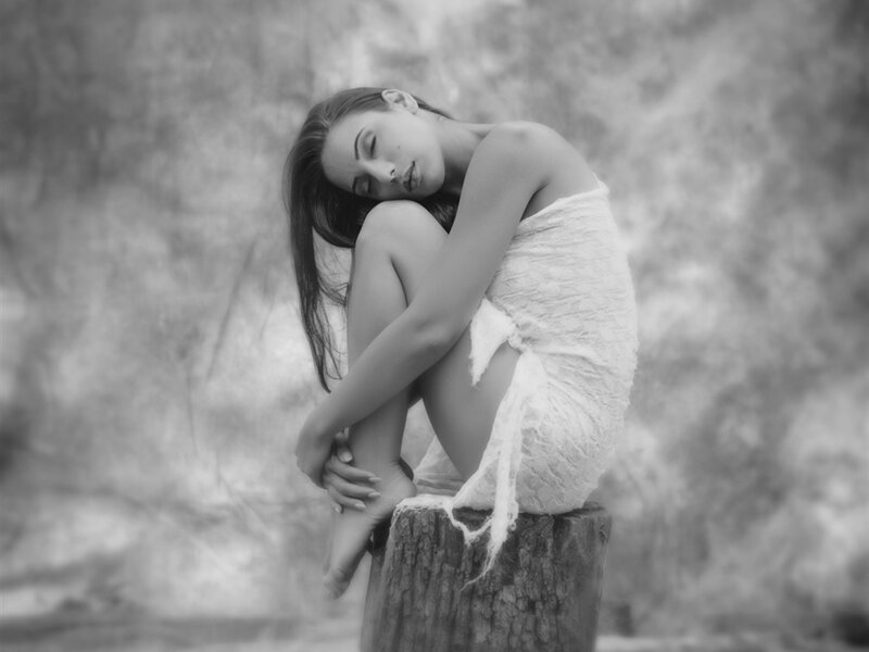 Woman Sitting on Stump — Black