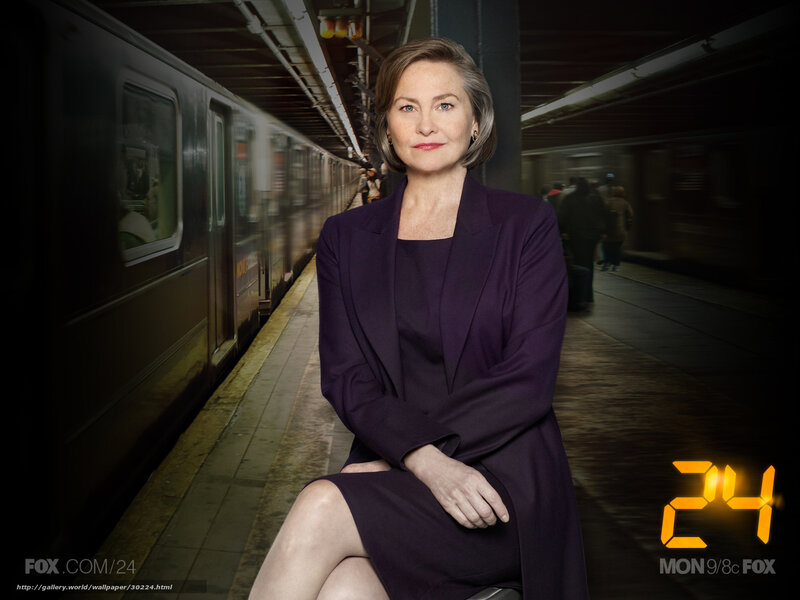 Woman Sitting on Subway Platform