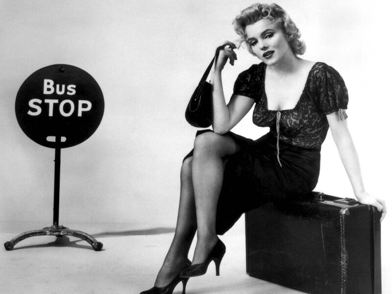 Woman Sitting on Suitcase — Black, Calm