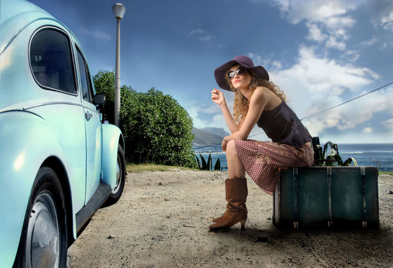 Woman Sitting on Suitcase — Blue, Dramatic