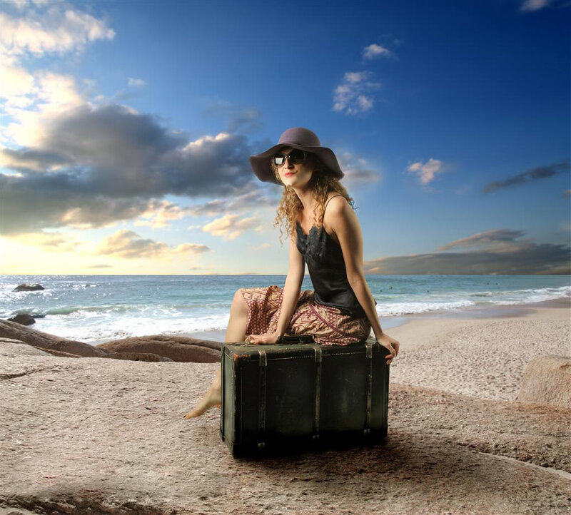 Woman Sitting on Suitcase — Blue, Serene