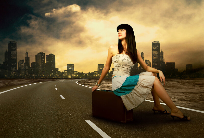Woman Sitting on Suitcase — Brown, Dramatic, Sunset