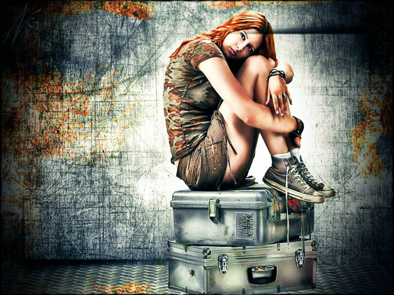 Woman Sitting on Suitcases — Gray