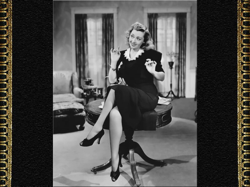 Woman Sitting on Table — Black, Confident