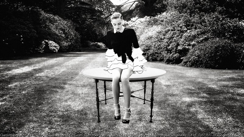 Woman Sitting on Table — Black, Dramatic, Afternoon