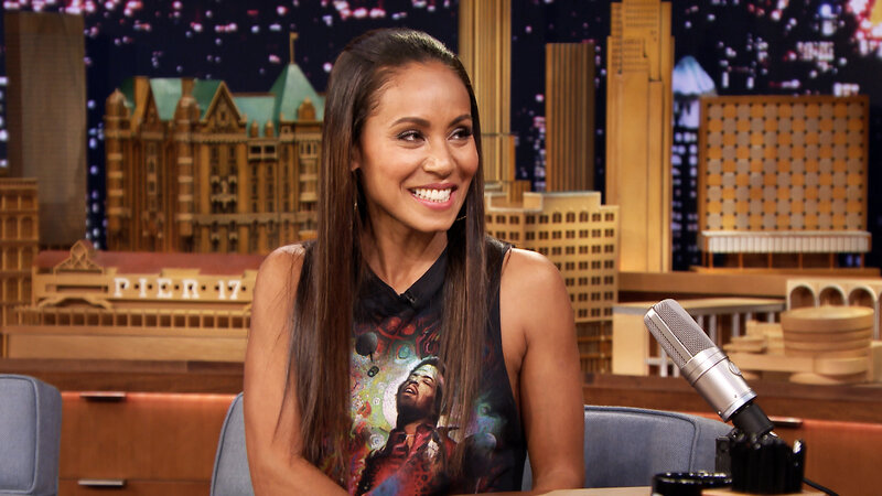 Woman Sitting on Talk Show Set