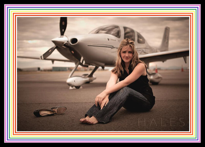 Woman Sitting on Tarmac