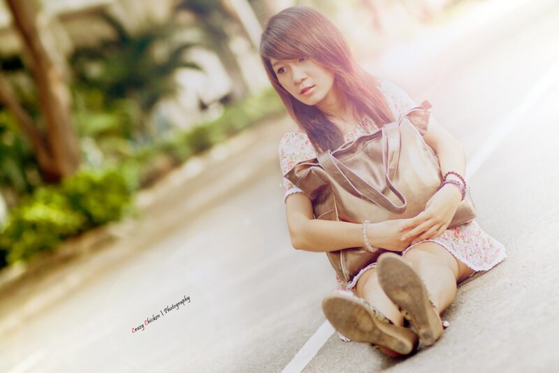woman sitting on the street