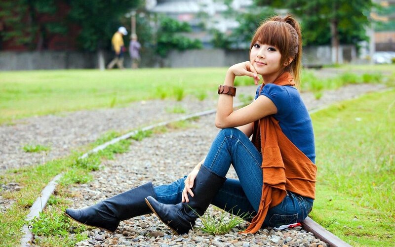 Woman Sitting on Train Tracks — Blue, Calm, Afternoon, Photograph