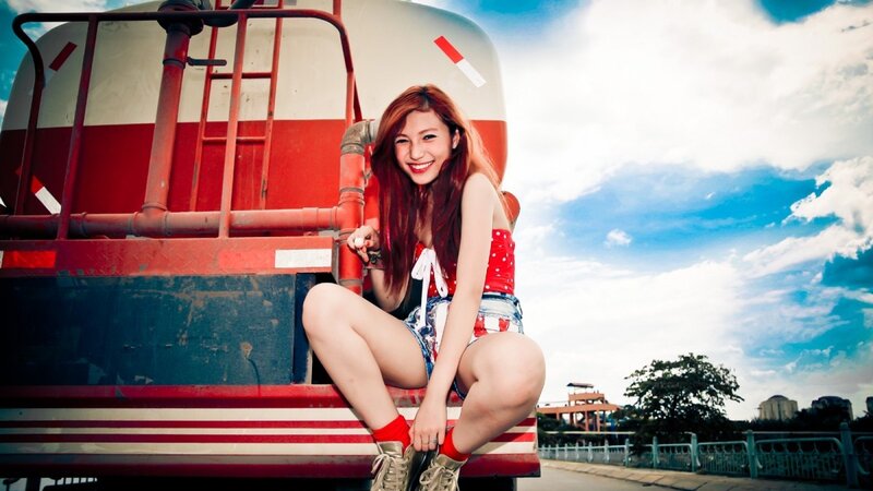 woman sitting on truck