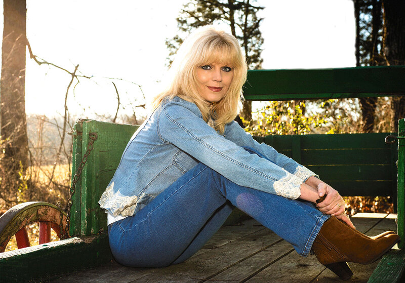 Woman Sitting on Wagon