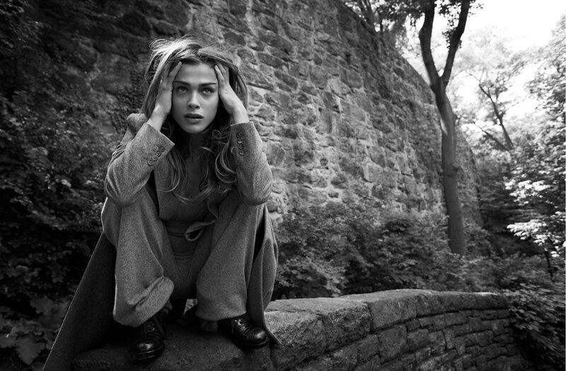 Woman Sitting on Wall — Black, Dramatic, Photograph