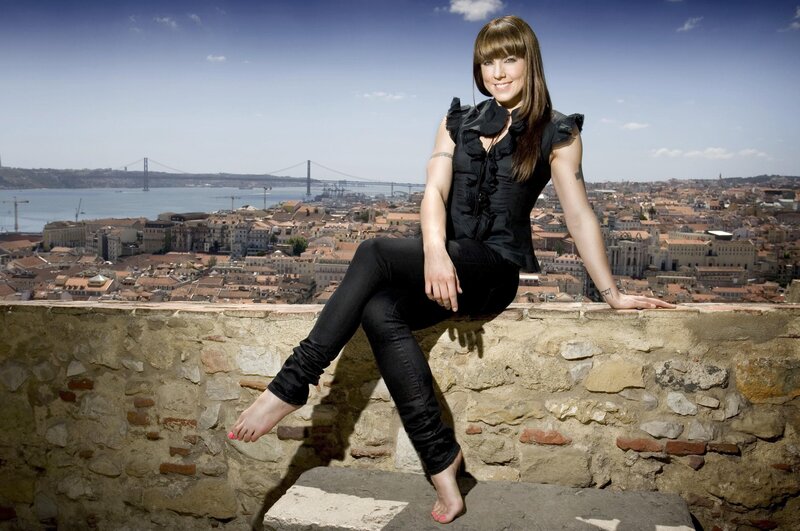 Woman Sitting on Wall — Black, Relaxed