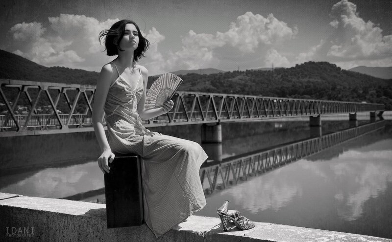Woman Sitting on Wall — Black