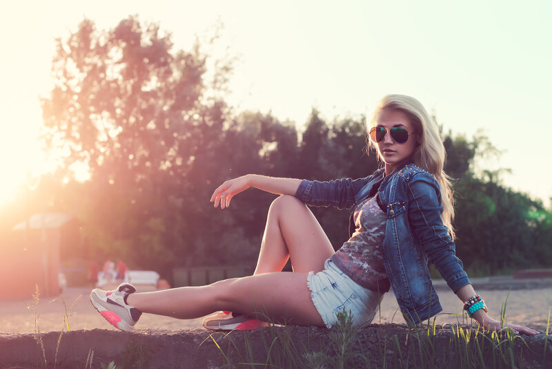 Woman Sitting on Wall — Blue, Relaxed