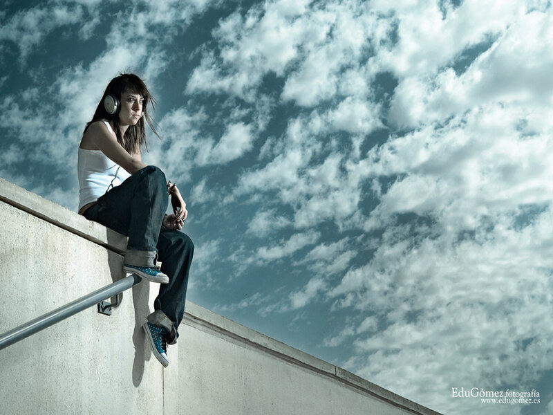 Woman Sitting on Wall — Blue