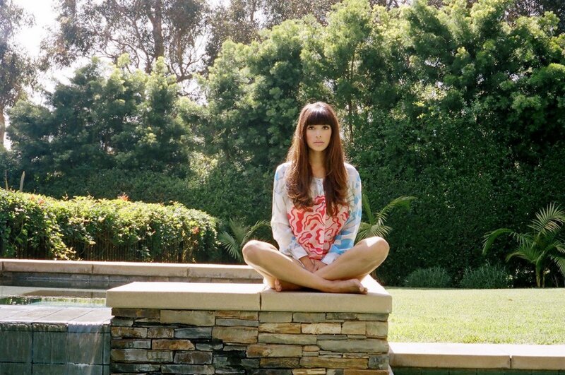 Woman Sitting on Wall — Green, Calm
