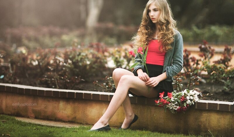 Woman Sitting on Wall — Green, Contemplative