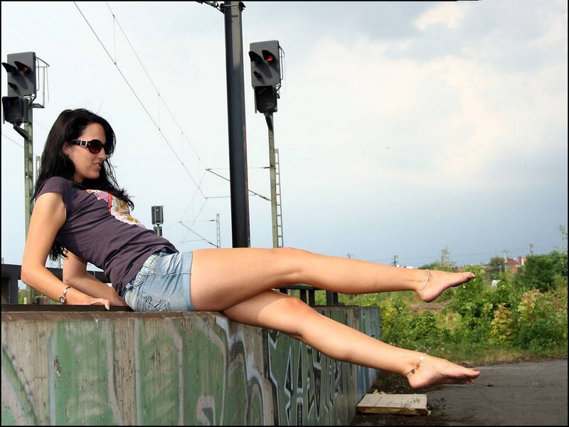 Woman Sitting on Wall — Green