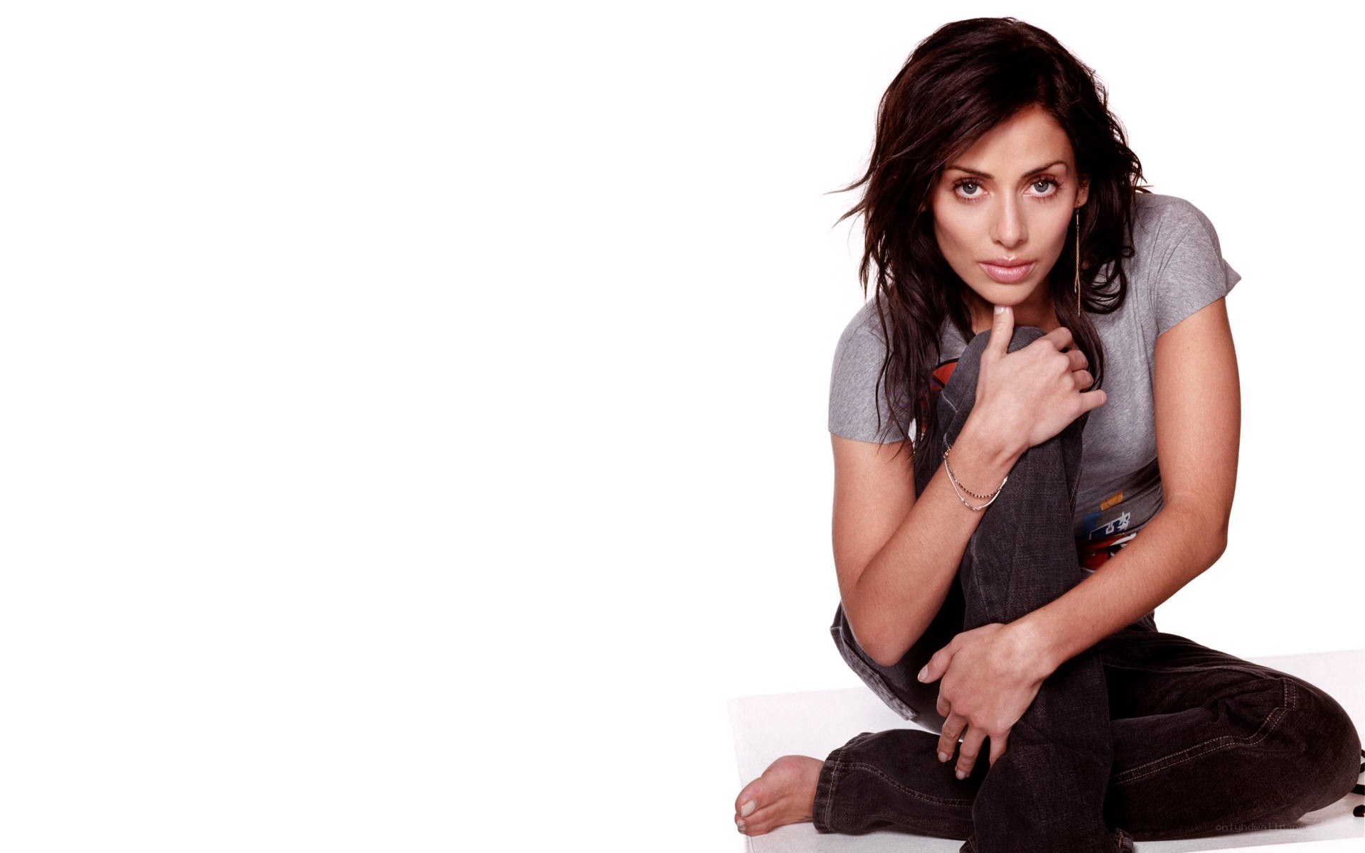 woman sitting on white background