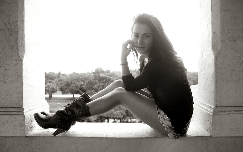Woman Sitting on Window Ledge — Black