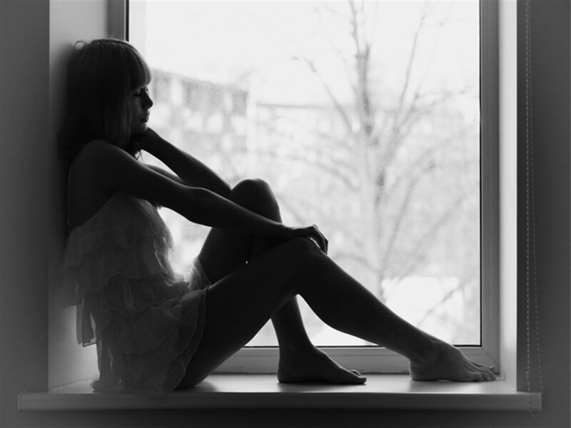 Woman Sitting on Windowsill — Black, Melancholic, Winter