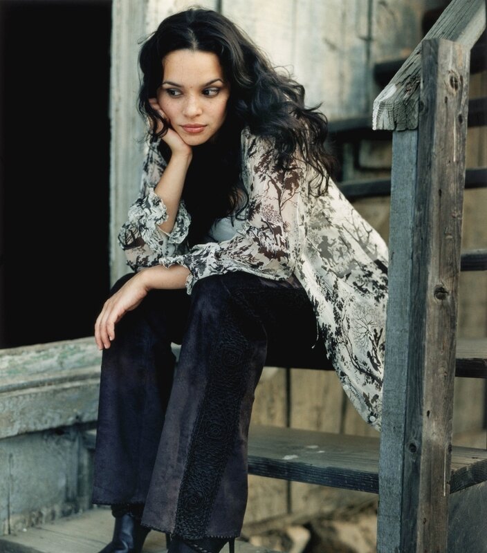 woman sitting on wooden steps