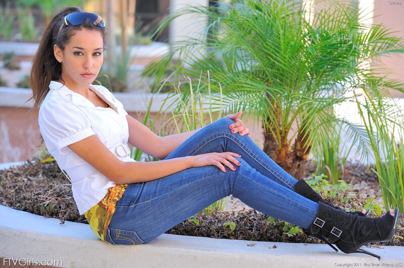 woman sitting outdoors