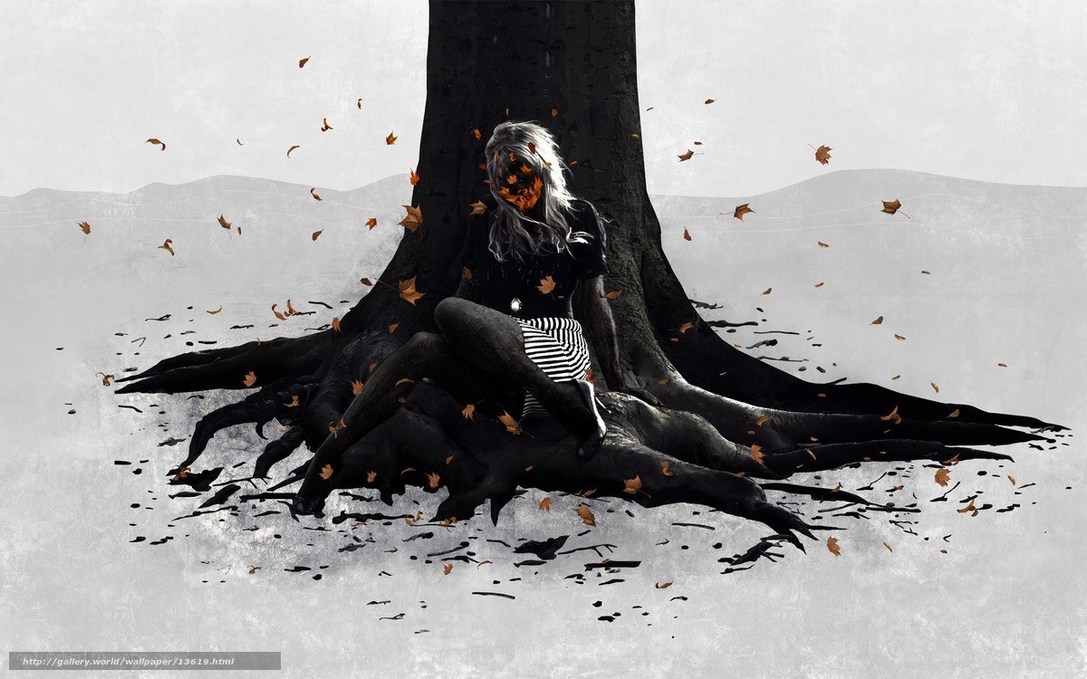 woman sitting under a tree