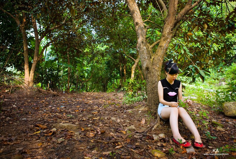 Woman Sitting under Tree — Green, Serene, Afternoon, Photograph, Leaves