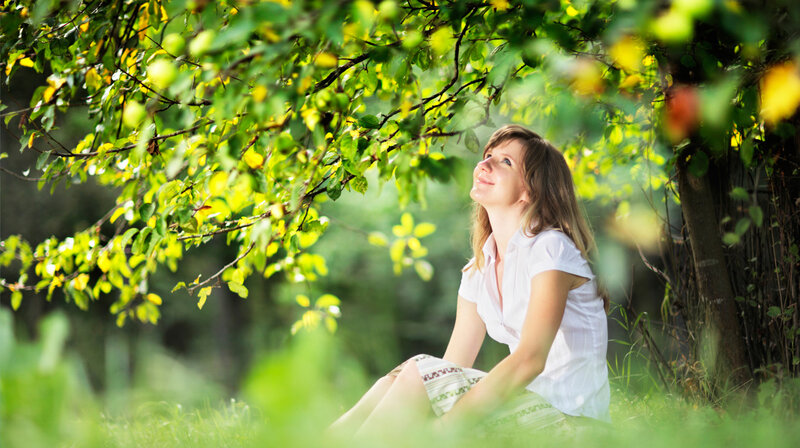 Woman Sitting under Tree — Green, Serene