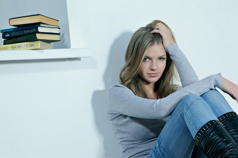 woman sitting with books