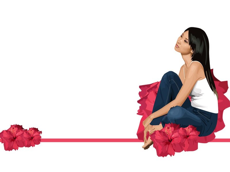 woman sitting with hibiscus flowers