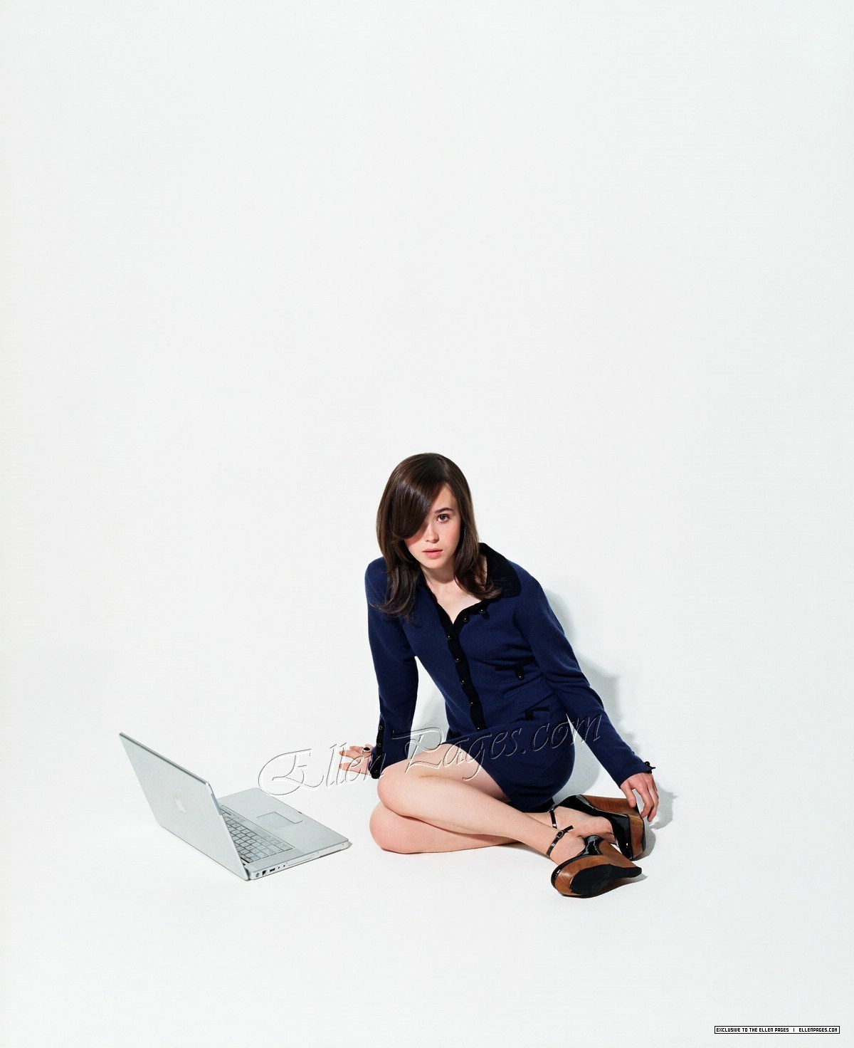 woman sitting with laptop