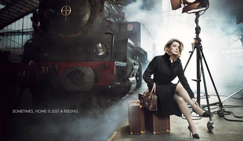 Woman Sitting with Luggage — Black